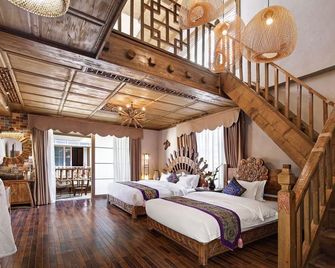 Floral Hotel·Xinzhong Riyue Hotel - Diqing - Quarto