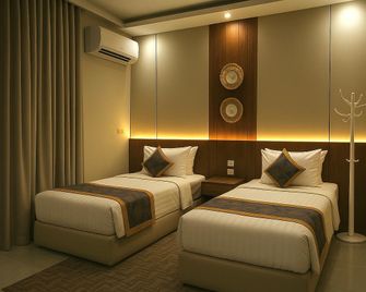 Tamyoz Alaqama Service Apartment - Ha'il - Schlafzimmer