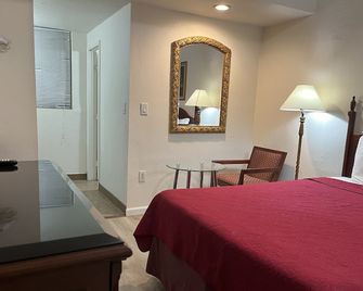 Economy Inn Paso Robles - פאסו רובלס - חדר שינה