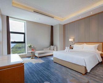 Xiyue Collection Hotel - Ан-Шун - Спальня