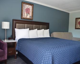 Budget Inn Orange - Orange - Bedroom