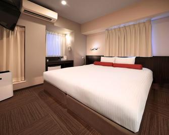 Nipponbashi Crystal Hotel - Osaka - Bedroom