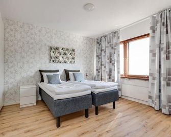 Santa's Holiday Homes - Rovaniemi - Bedroom