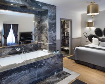 فندق باريس متحف اللوفر - باريس - غرفة نوم