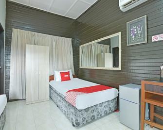 Hotel O Asiacamp Resort National Park Kuala Tahan - Kuala Tahan - Schlafzimmer