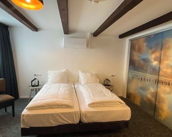 Hotel Restaurant De Stadsherberg - Franeker - Schlafzimmer