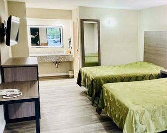 Brentwood Inn & Suites - Suffolk - Habitación