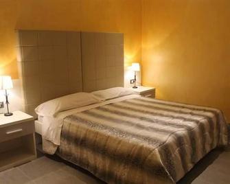 B&b Fiumicino Airport Resort - Fiumicino - Phòng ngủ