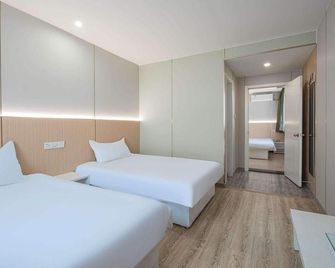 Ripple Hotel (Tianjin Fujian Road Xiawafang Metro Station) - Tianjín - Habitación