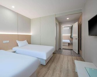 Ripple Hotel (Tianjin Fujian Road Xiawafang Metro Station) - تيانجين - غرفة نوم