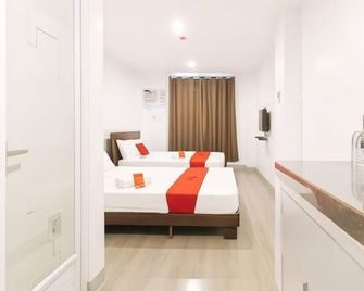 RedDoorz near Zobel Roxas St - Makati - Slaapkamer