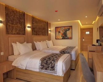 Grand Season Hotel - Акаба - Спальня