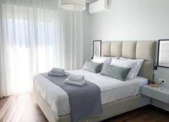 Simplycity Homestay Apartments - Kremasti - Schlafzimmer
