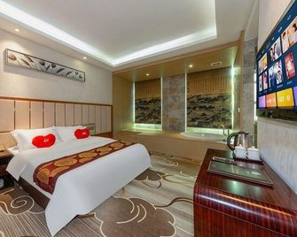 Jun Chen Health Hotel - Cantão - Quarto