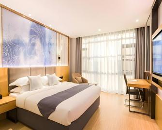 Greentree Eastern Hotel Tianjin Dongli Development Zone Xinli Metro Station - تيانجين - غرفة نوم