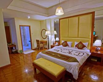 Gold Yadanar Hotel - מנדאליי - חדר שינה