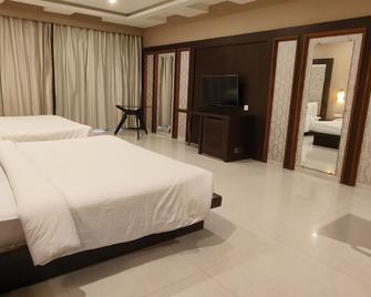 Anjushree Hotel - Ujjain - Bedroom