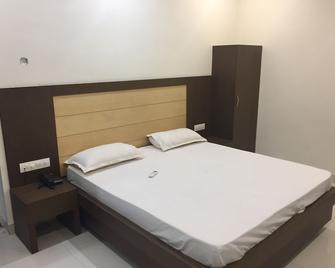 Hotel Swapna - Vijayawada - Schlafzimmer