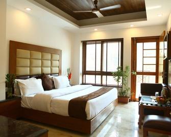 Hotel Devlok Primal - Mussoorie - Schlafzimmer