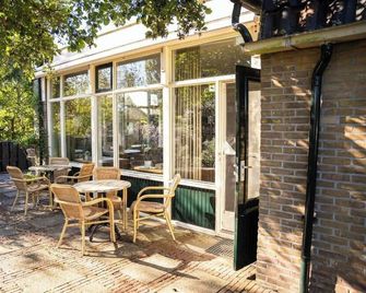 Hotel De Horper Wielen - Kaart - Innenhof