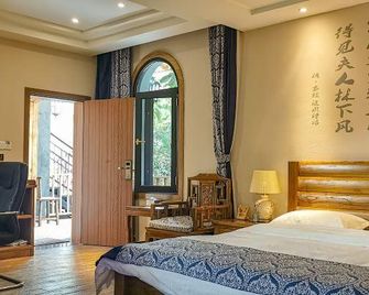 Suiyuan Yododo Inn - גויאנג - חדר שינה