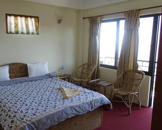 Hotel Nagarkot Holiday Inn - Nagarkot - Ložnice
