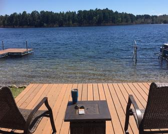 Northwoods lake home ideally located for many winter activities - Solon Springs - Patio