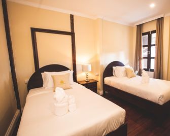 Le Luxe Boutique Hotel - ויינטיאן - חדר שינה