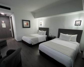 We Hotel Aeropuerto - Mexiko-Stadt - Schlafzimmer