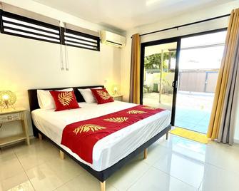 Muna house and private pool - A/C - optic fiber Wi-Fi - 3 pers - Punaauia - Sypialnia