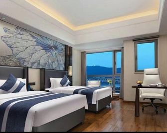 Changsha Jiaruide Hotel - צ'נגשה - חדר שינה