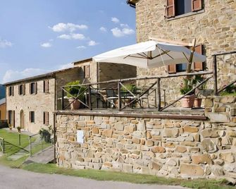 Pugnano Alto -appartamento Castagna - Lisciano Niccone