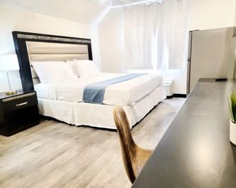 Guest Lodge - Minot - Bedroom