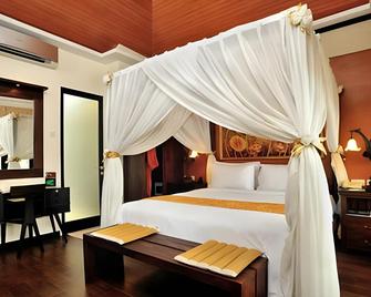 Savali Hotel - Padang - Habitación