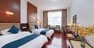 Shengyuan International Hotel - Shangrao - Bedroom