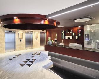 Exe Prisma - לס אסקלדס - דלפק קבלה