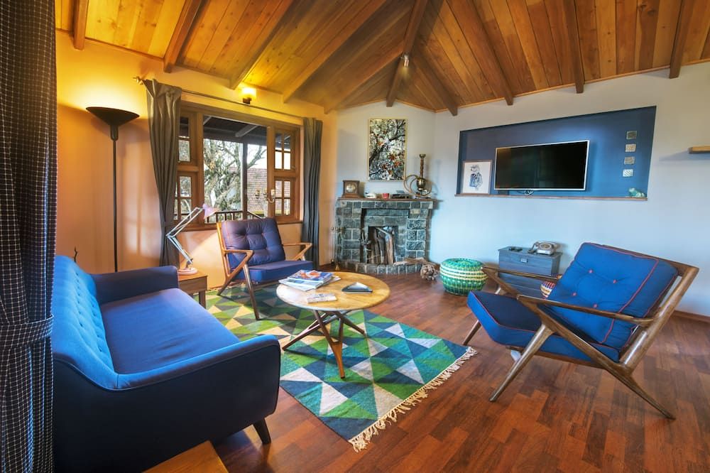 فيلا ريتريت - بوتيك هوتل آند كوتيدجيز - كودايكانال - غرفة معيشة