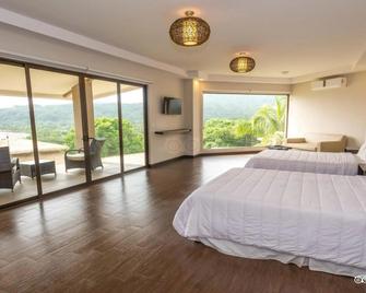 Nammbu Beach Front Bungalows - Sámara - Κρεβατοκάμαρα