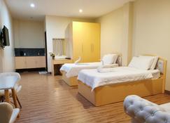 Acrige Apartelle 2-4 pax Queen @ heart of Bogo City - Bogo City - Bedroom