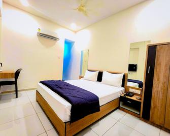 Hotel Near me - Rajkot - Ložnice