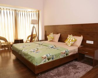 Atithi Stays - Rāmnagar - Bedroom