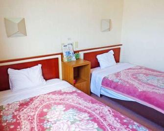 Business Hotel Minami - Uozu - Ložnice