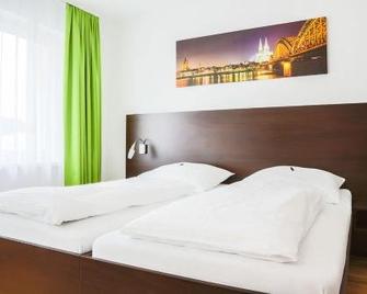 A3 Hotel - Oberraden - Bedroom