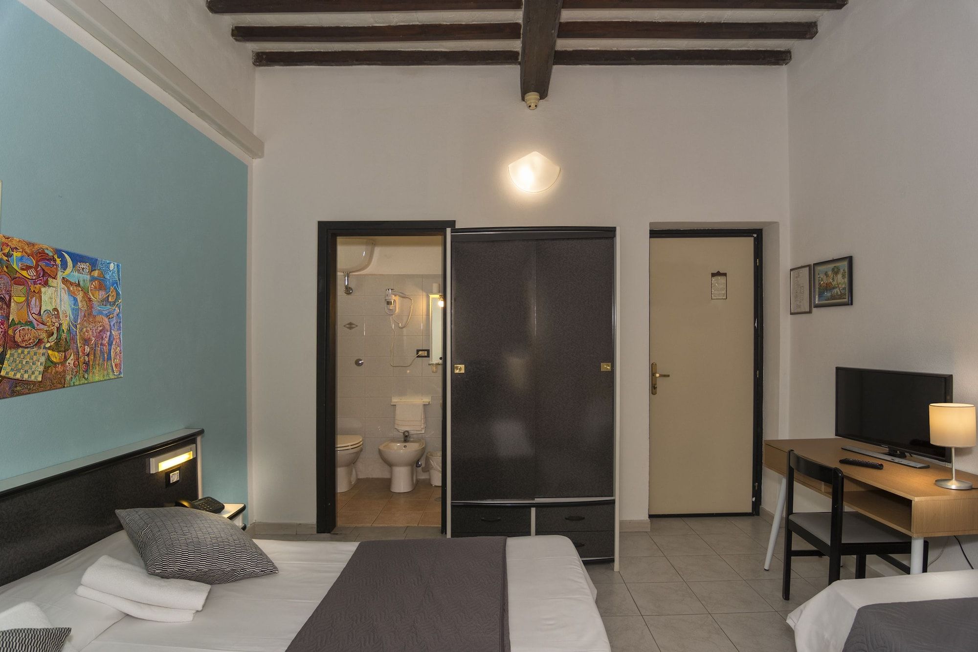 هوتل أمالفيتانا - بيسا - غرفة نوم