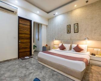 Hotel Fortune Inn By Aspl - Noida - Slaapkamer