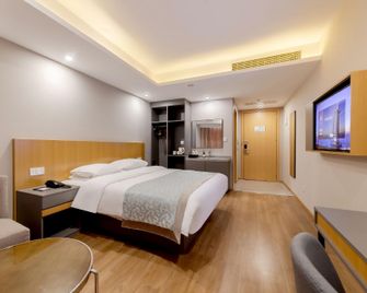 Super 8 Hotel Guangyuan Tuteng Square - Guangyuan - Bedroom