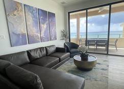 Luxury Ocean front SeaDreams 2 with 7 Mile Beach Views - West Bay - Living room