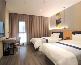 Gem Hotel Nantong Railway Station Wanxiang Cheng - Nantong - Schlafzimmer