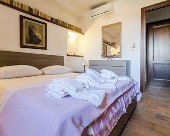 La Casina di Rosi vivere nellantico borgo - Castiglione della Pescaia - Camera da letto