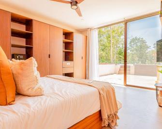 Top level apartment with jacuzzi, shared pool, gym, & tennis courts - Xpu Há - Habitación